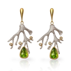 Silver earrings with rough peridot and white zircon, featuring a nature-inspired branch design and gold accents