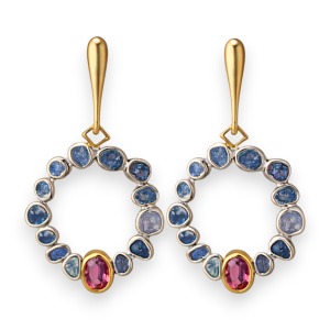 Silver hoop earrings featuring pink topaz and rough sapphires with a bold, artistic design, ideal for statement jewelry lovers.